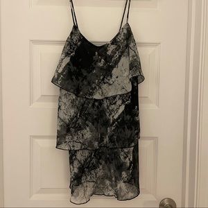 Prevent Black &white flowy top. Size M